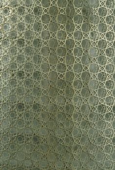 an image of the back side of a curtain with circles on it's fabric