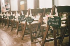 the chairs are lined up with signs on them