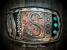 The Rowdy Rose specializes in the custom design of western belt buckles, jewelry, trophy awards and more. Customize any of our existing styles and add your own text, logo and unique flair for an item that you can find nowhere else on the market. All of our pieces are 100% hand-made and built to last a lifetime. Fill out the custom order form below to get started on your custom product design today! Artisan Engraved Belt Buckles As Gift, Artisan Engraved Belt Buckles For Gifts, Handmade Western Belt Buckles As Gift, Handmade Western Belt Buckles For Gift, Western Hand Tooled Belt Buckles As Gift, Cowgirl Belt Buckles, Cowgirl Lifestyle, Custom Order Form, Custom Belt Buckles