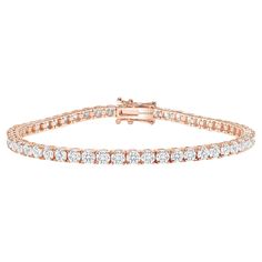 This diamond tennis bracelet features beautifully cut round diamonds set gorgeously in 14k gold. Metal: 14k Gold Diamond Cut: Round Natural Diamond Total Diamond Carats: 2ct Diamond Clarity: VS Diamond Color: F-G Color: Rose Gold Bracelet Length: 6 inches Bracelet Tennis, Round Diamond Setting, Diamond Tennis Bracelet, Vs Diamond, Rose Gold Bracelet, Quiet Luxury, Yellow Gold Bracelet, Tennis Bracelet Diamond, 2 Carat