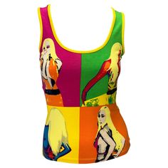 Presenting an iconic vibrant pop art Versace tank top, designed by Donatella Versace. From the Spring/Summer 2004 collection, this top debuted on the season's runway as part of look 31 modeled by Karolina Kurkova. This bright top proudly features pop art renditions of Donatella at the front in her iconic Spring 2000 pink jungle print dress and 'call me 1 900 d-o-n-a-t-e-l-l-a' at the back. Approximate measurements: Size - IT38 / US4 21" shoulder to hem 29" - 38" bust 26" - 30" waist 90% cotton, Vintage Dior Dress, Karolina Kurkova, Art Outfit, Dior Dress, Velour Tops, Donatella Versace, Jungle Print, Cindy Crawford, Old Hollywood Glamour