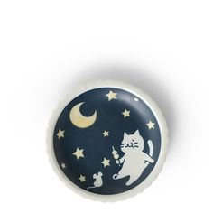 an image of a cat on the moon with stars and crescents painted on it