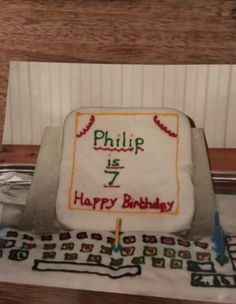 a birthday cake with the number seven on it