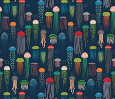 an image of jellyfishs in the ocean with different colors and patterns on them