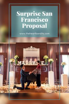 two people standing in front of a table with flowers on it and the words surprise san francisco proposal above them