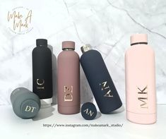 six different colored bottles are lined up against a marble background with the words diy written on them