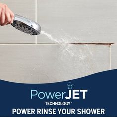 a person spraying water onto a shower head with the words power jet technology on it