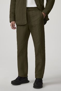 The Carlyle Quilted Pant is made with Nylon Pongee for water-repellent, wind-resistant protection with a smooth, sheen finish. It has an elasticized waistband and zipper fly and is equipped with two front side-entry pockets and a single back welt pocket,  providing optimal comfort with simple aesthetics. The Carlyle Pant is insulated with 100% TENCEL™ Lyocell, a biodegradable fibre made from wood pulp harvested from sustainably managed forests. Journey Boots, Simple Aesthetics, The Carlyle, Quilted Pants, Men Parka, Baby Outerwear, Mens Parka, Snow Pants, Snow Suit