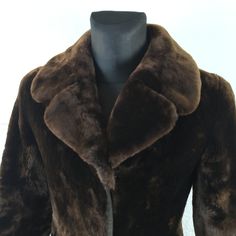 Vintage 60's dark brown very soft Fur Coat with huge collar, Size M  (Check measures before buying) Amazing Faux leather coat with Real leather trim on the edges of coat and collar. Beautiful and unique women's "BERGSTROM" overcoat with inner lining, 2 pockets outside.  Comfortable, very elegant and in good condition. The perfect fur coat for winter street wear. Perfect for your wardrobe. Type:   Coat Color:  brown Size:    US M . Check measures before buying. Material:   Genuine leather, Faux l Winter Street Wear, Short Fur Coat, Warm Winter Jacket, 60s Women, Long Leather Coat, Warm Winter Jackets, Faux Leather Coat, Winter Street, Brown Fur