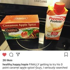 an orange juice and carton of cinnamon apple spice sitting on a stove top next to each other