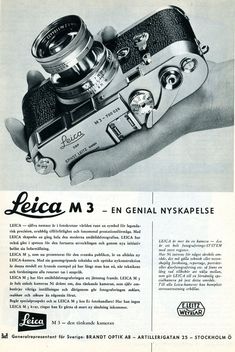 an advertisement for leica m3 camera in the 1950's, with hand holding it