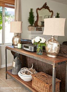 an image of a living room setting on the pinterest page with text that reads best table ideas on pinterest