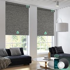 a living room with two couches and windows covered in roman blind shades that have green arrows on them