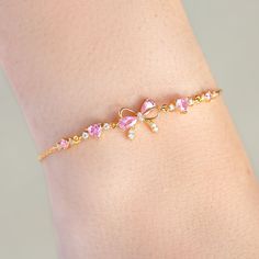 Tie your style together with our Little Bow Peep Bracelet– a sweet and chic accessory that's the 'knot'-ty solution to your fashion needs! This bracelet features a dainty pink bow, adding a touch of playful elegance to any outfit. This bracelet is the perfect way to add a 'bow-tiful' finishing touch to your look! Bows Fashion, Jewelry For Girls, Girl Accessories, Big And Little Sorority Gifts, Cheap Stuff, Mommy And Me Jewelry, Bracelets And Necklaces, Accessories Cute, Nice Gifts