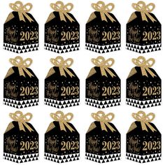 twelve black and gold new year's evet tags with the number 20 on them