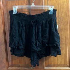 Brand New Size Large Black Skirt Summer High Waist Black Mini Skirt, Black Casual Summer Skirt, Casual Black Summer Skirt, Black Casual Mini Skirt For Summer, Black Summer Mini Skirt, Black Summer Mini Skirt For Beach, Chic Black Shorts With Elastic Waistband, Casual Black Mini Skirt With Built-in Shorts, Black Skort With Built-in Shorts For Spring