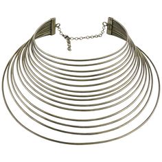 JEAN PAUL GAULTIER vintage Masai multi wire silver toned choker necklace. Silver tone metal hardware. Lobster clasp closure. Marked GAULTIER. Indicative measurements : wearable inner circumference approx. 37.70 cm (14.84 inches) / max. opening approx. 7.5 cm (2.95 inches). NOTES - This is a preloved vintage item, therefore it might have imperfections. - Colors may differ slightly from actual product appearance due to differences in lighting conditions. - As a buyer, you are fully responsible for Jean Paul Gaultier Vintage, Choker Necklace Silver, Paul Gaultier Spring, Metal Choker, Silver Choker, Paul Gaultier, Jean Paul Gaultier, Jean Paul, Necklace Silver