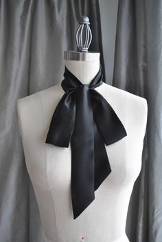 "NEW Unique and simple neck piece. Endless possibilities to style it. Can be worn as a bow tie, tie, bow at the back, with your favorite brooch, like a belt, like a scarf and more. Be unique, Be different, Be yourself! Made of beautiful silk charmeuse. Color black. Size is about 2\" wide and 60\" long The listing is for ONE scarf black color ( photo 1) All my scarfs and shawls are professionally done by me in my studio in Virginia. They easy to tie, believe me you can do itself! All of them made Women Bow Tie Outfit, Narrow Scarf, Bow Choker, Black Silk Scarf, Head Scarf Tying, Silk Neck Scarf, Tie Women