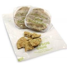 three pieces of food sitting on top of a plastic bag