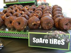 there are many doughnuts on display for sale