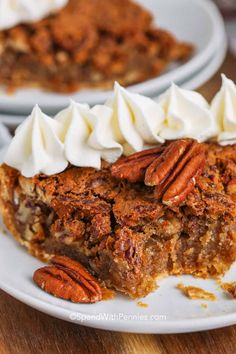 a slice of pecan pie with whipped cream on top