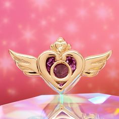 14K Yellow, White or Rose Gold Description & Features: Be your own pretty guardian with this Crisis Moon Compact, a piece fit for any Sailor Moon fan! 10mm x 5.5mm threaded end with (1) 3mm Pink Sapphire AA Heart in Bezel Available in 16 ga. or 14 ga. ★★★★★★★★★★★★★★★★★★★★★★ Brand: Body Vision Los Angeles - BVLA Collection: 42250 Material(s): 14K gold, Pink Sapphire AA Item Code: #3054 ( 3054 ) PSAA Commonly worn in: earlobes, sensitive lobes, cartilage, conch, tragus Search Keywords: bodyvision, Crisis Moon Compact, Sailor Moon Jewelry, Body Vision Los Angeles, Gold Gauges, Gold Body Jewellery, Gold Bodies, Jewelry Companies, Tragus, Conch