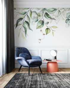 a blue chair sitting in front of a mirror on top of a wooden floor next to a rug