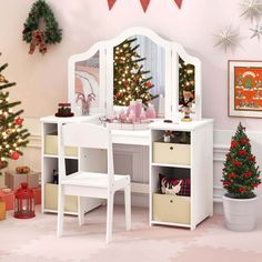 there is a white desk with a mirror on it and christmas decorations in the corner