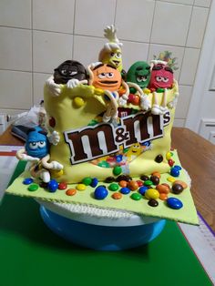 a birthday cake with m & m's on it