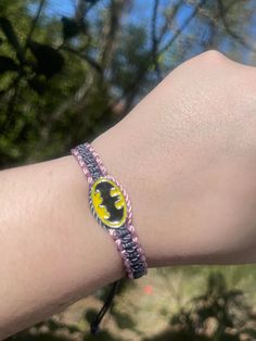 Set a fun tone for your relationship with these handmade Batman matching couples’ bracelets! Crafted with care, these accessories are perfect for couples who share a love for the Caped Crusader! Show your commitment to each other and your fandom with these unique Batman Neon Friendship Bracelets! #dynamicduo ☆ We work as quickly as possible to create your bracelets. However, since each order is handmade to order it can take 7-10 business days for your order to be shipped. (This does not include Pink Adjustable Themed Beaded Bracelets, Pink Themed Adjustable Beaded Bracelets, Adjustable Pink Themed Beaded Bracelets, Handmade Adjustable Bracelet For Best Friend Gift, Pink Handmade Themed Bracelets, Handmade Themed Pink Bracelets, Themed Handmade Pink Bracelets, Adjustable Novelty Jewelry For Best Friend Gift, Adjustable Themed Beaded Bracelets Gift