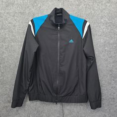 Vintage 90s Adidas Windbreaker Jacket Mens Medium Black Blue White Full Zip Good Preowned Condition See pictures for measurements and condition. Size on Tag can be different from actual size of the item due to previous washings, age, manufacturer. Vintage Clothes are smaller than modern same size clothing. All clothes are clean and stored in Smoke Free and Pet Free environment. We offer same day shipping. 90s Adidas, Windbreaker Jacket Mens, Adidas Windbreaker, Adidas Vintage, Vintage Clothes, Men's Coats And Jackets, Windbreaker Jacket, Adidas Men, Mens Coats