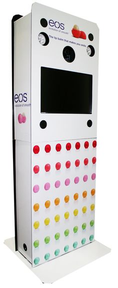 an electronic device with multiple colored dots on the front and sides, as well as buttons