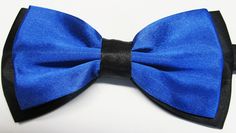 "Beautiful pre-tied and adjustable double tiered banded bow tie. Will adjust from 13\" through 20\" neck. Bow dimensions 2.5\" x 4.5\". Bow tie comes complete with matching free pocket square. Always made by hand and to your special order. Weddings and groups are welcome." Blue Standard Bow Tie For Black Tie Events, Blue Bow Tie For Black Tie Events, Adjustable Blue Standard Bow Tie, Adjustable Blue Bow Tie, Adjustable Blue Standard Tie Bow, Blue Adjustable Standard Tie Bow, Blue Satin Bow Tie, Adjustable Blue Bow With Bow Tie Back, Adjustable Blue Satin Bow