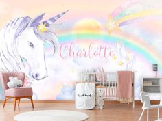 a baby's room with a unicorn mural and rainbow wallpaper, including the name charlotte