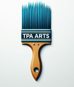 a brush with the words tpa arts on it sitting on top of a white wall