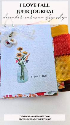 an open journal with flowers on it and the words i love fall junk journal written in cursive writing