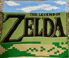 the legend of zelda crochet pillow is on display