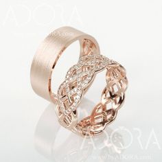 two wedding bands with diamonds on each band, one in rose gold and the other in white