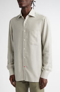 Breathable cotton enriched with sumptuous Italian cashmere offers lasting comfort in this classic striped shirt grounded in the Neapolitan label's storied tailoring. Each shirt takes a single craftsperson more than two hours to make—from careful fabric selection to hand-sewing the collar and button holes. Front button closure Spread collar Long sleeves with button cuffs Chest patch pocket 85% cotton, 15% cashmere Dry clean Made in Italy Designer Clothing Cotton Collared Shirt Wrinkle-resistant, Striped Cotton Button-up Shirt, Cotton Wrinkle-resistant Collared Shirt, Relaxed Fit Button-up Shirt With Striped Cuffs, Cotton Button-up Shirt With Signature Stripes, Button Holes, Striped Shirt, Patch Pocket, Button Up Shirts