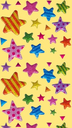 colorful stars are arranged on a yellow background