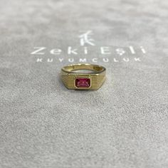 Ruby vintage Ring signed by ZEK Jewelry The ring designed with the channel setting system will add a timeless touch to your style. It offers the perfect gift idea while adding vintage splendor to all outfits. Retro Formal Rings With Polished Finish, Retro Rings With Polished Finish For Formal Occasions, Retro Polished Rings For Formal Events, Classic Formal Ruby Ring With Channel Set, Classic Channel Set Ruby Ring For Formal Occasions, Vintage Gold Birthstone Ring With Bezel Setting, Vintage Birthstone Ring With Bezel Setting, Retro 14k Gold Ring As Gift, Retro 14k Gold Ring For Gift