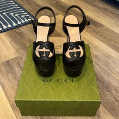 Purchased In London, Cannot Wear Due To Foot Surgery. Never Worn New In Box Authentic Guaranteed Size 8. Style Still Sold In Stores Retail $1100. 4.7" Wooden Block Heel, 1.2" Platform, Feels Like 3.5" Luxury Gucci Slip-on Sandals, Black Gucci Thong Sandal Size 39, Gucci Marmont Platform Sandals, Gucci Block Heel Shoes With Buckle Closure, Gucci Sandals With Buckle And Block Heel, Gucci Sandals With Buckle Closure And Block Heel, Gucci Block Heel Sandals With Buckle Closure, Gucci Designer Heels With Buckle Closure, Designer Gucci Sandals With Open Heel