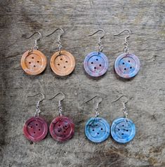 Keep a button on you at all times for good luck and emergency clothing repair!  Select what color blend you like or let us surprise you! We also love specific color/vibe requests, so if you have something particular please do not hesitate to request! Every piece will have that distinctive color marbling that comes from the recycling process Earring hardware is nickel-free and iron plated, wire style, all assembled in our workshop! Our buttons are handmade, crafted from 100% recycled plastic that we collect from businesses and individuals around our hometown of Akron, OH! We're working hard to do our part of diverting plastic waste from the landfills by making durable, beautiful items in our small workshop for all to enjoy. :)  OUR PROCESS:  At Tansy Recycling, we collect plastic from Akron Emergency Clothes, Clothing Repair, Recycling Process, Color Vibe, Repair Clothes, Plastic Earrings, For Good Luck, Button Earrings, Earring Crafts