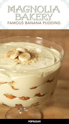 a dessert in a glass with bananas on top