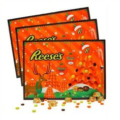 two bags of reese's candy sitting next to each other