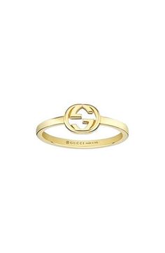 The recognizable GG-logo centers this 18-karat-gold ring that's perfect for stacking. 1/4" pendent; 1/8" band 18k gold Made in Italy Gucci Ring Gold, Gucci Yellow Gold Rings For Formal Occasions, Gucci Designer Rings In 14k Gold, Gucci Fine Jewelry Yellow Gold Rings, Gucci 14k Gold Designer Rings, Gucci Yellow Gold Fine Jewelry Rings, Designer Gucci 14k Gold Rings, Gucci Gold Rings For Anniversary, Gucci White Gold Ring Formal