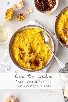 two bowls of saffron risotto with crispy shallots on the side