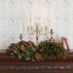 magnolia centerpiece styled on mantle Magnolia Wedding Theme, Magnolia Leaves Wedding, Magnolia Centerpiece, Decorating Tables, Magnolia Wedding, Piedmont Park, Magnolia Leaves, Temperature And Humidity, Light Shades