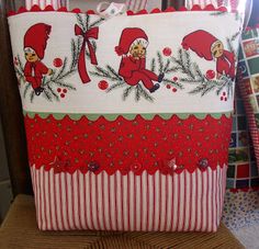 a red and white bag sitting on top of a chair