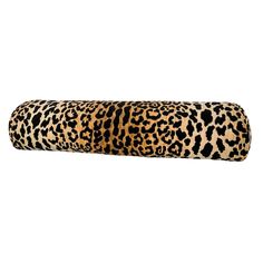 an animal print roll pillow on a white background, with the top half rolled up